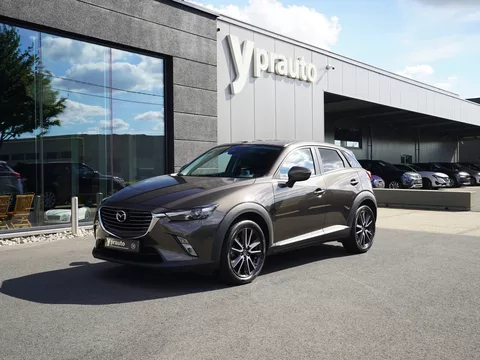 Mazda CX-3 2.0i SKYACTIV-G Aut Leder Camera Trekhaak Navigatie 18″ Alu Parkeersensoren Cruise RadioCD Verwarmde zetels Klimaatregeling Privacy Laneassist